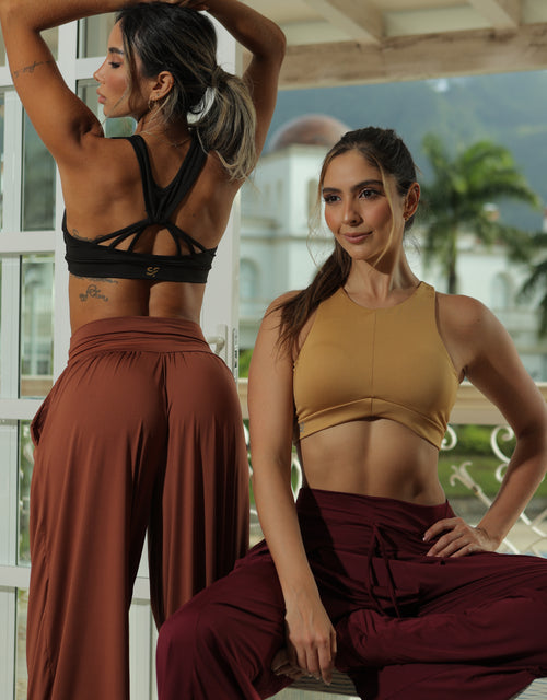Load image into Gallery viewer, Pantalón amplio con bolsillos, elaborado en poliéster ultra liviano
